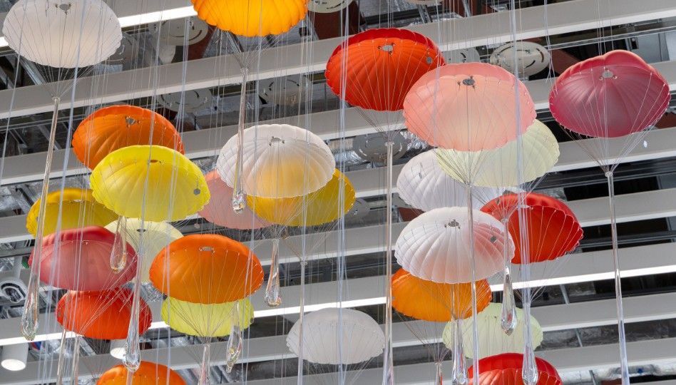 Atmospheric Reflections of the North, the newly unveiled chandelier installation at the heart of Terminal 2 Security East